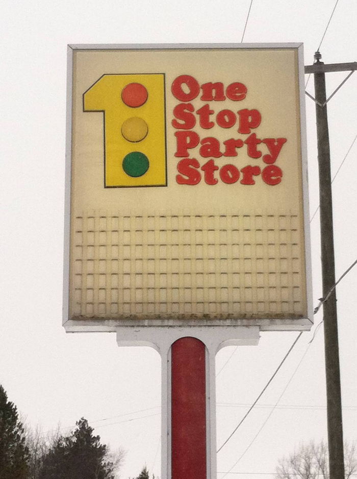 One Stop Party Store - The Sign Going Up - Probably 1970S (newer photo)